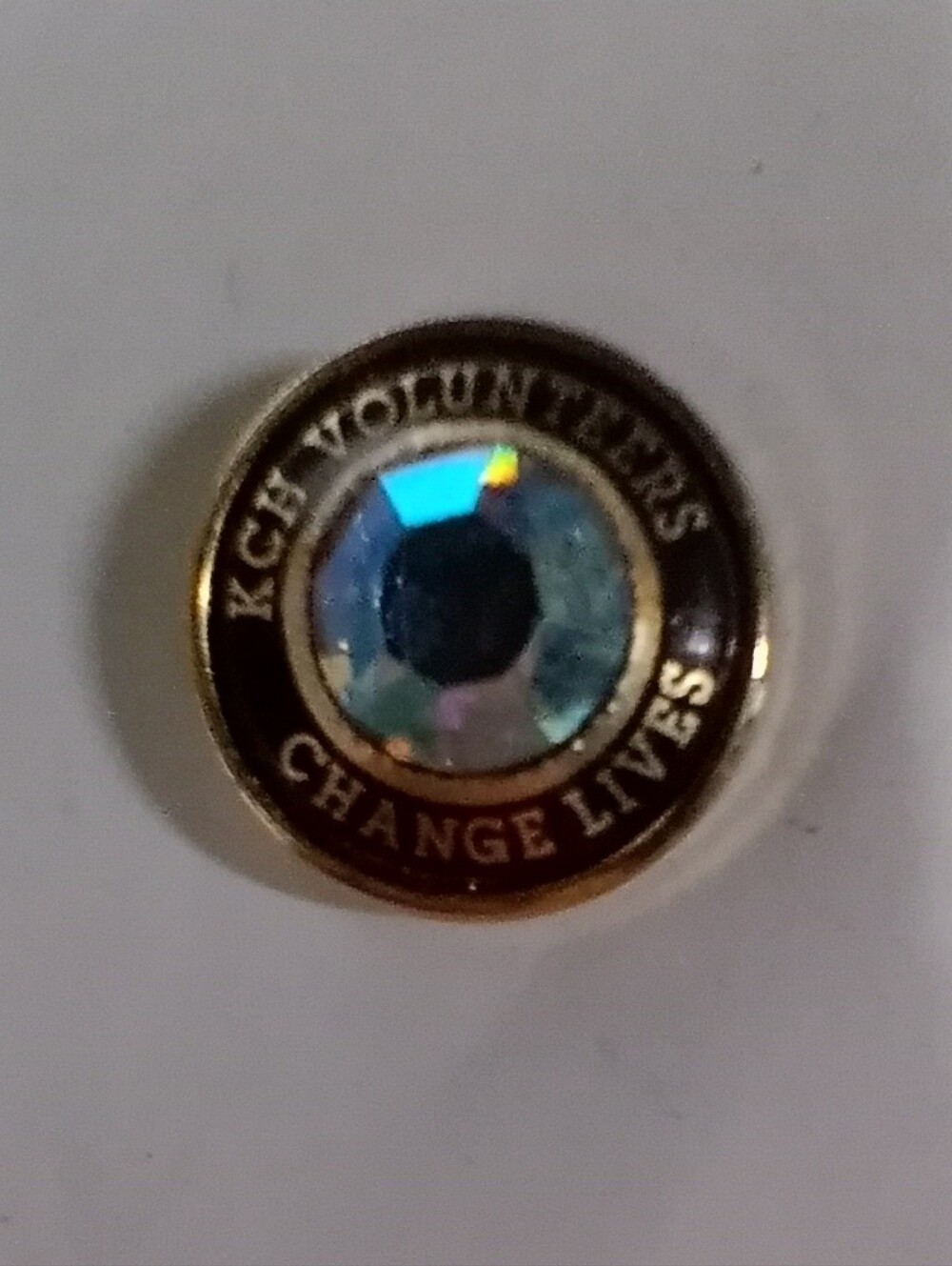 Circle Pin with Iridescent Center and Gold Rim